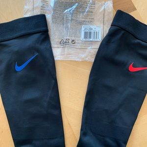 Nike Black Compression Sleeves with Blue and Red Swoosh